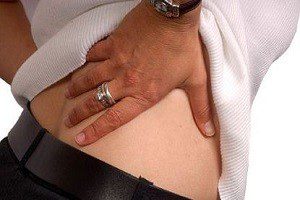 Болит внизу спины с правой стороны спины