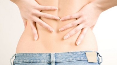 Если у девушек болит спина внизу